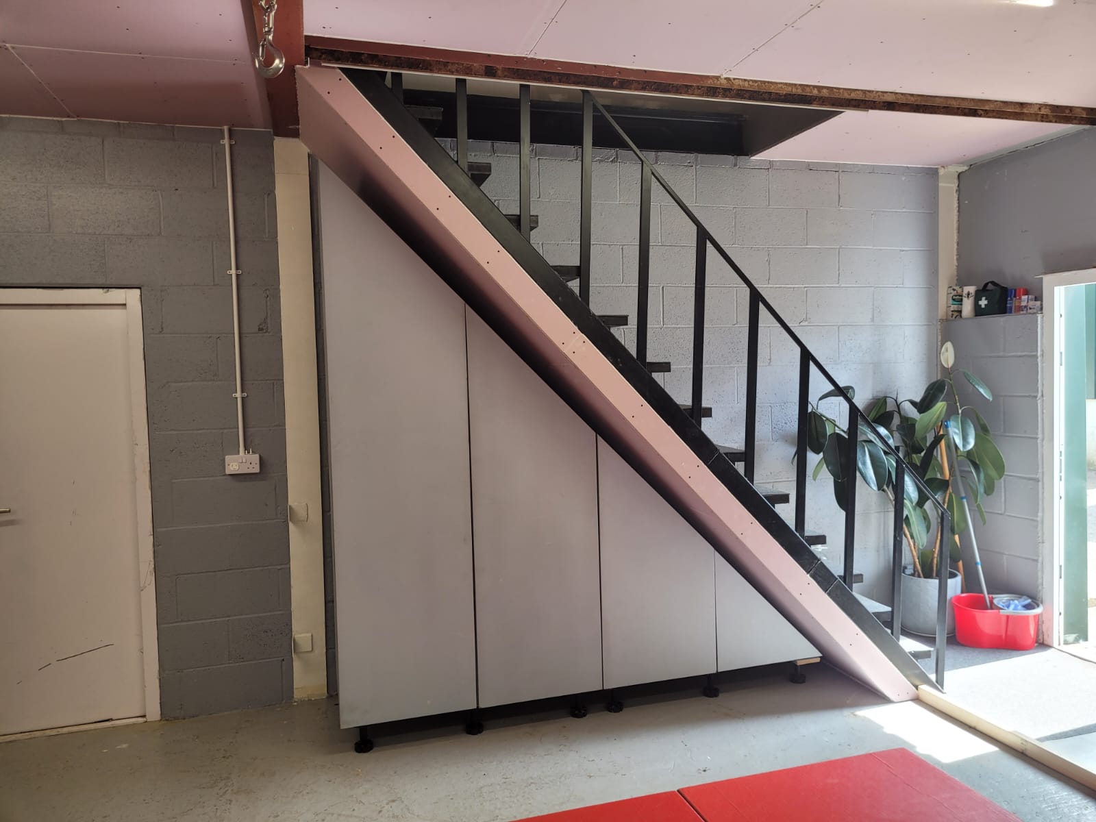 Staircase finished with boarding and under-stair storage