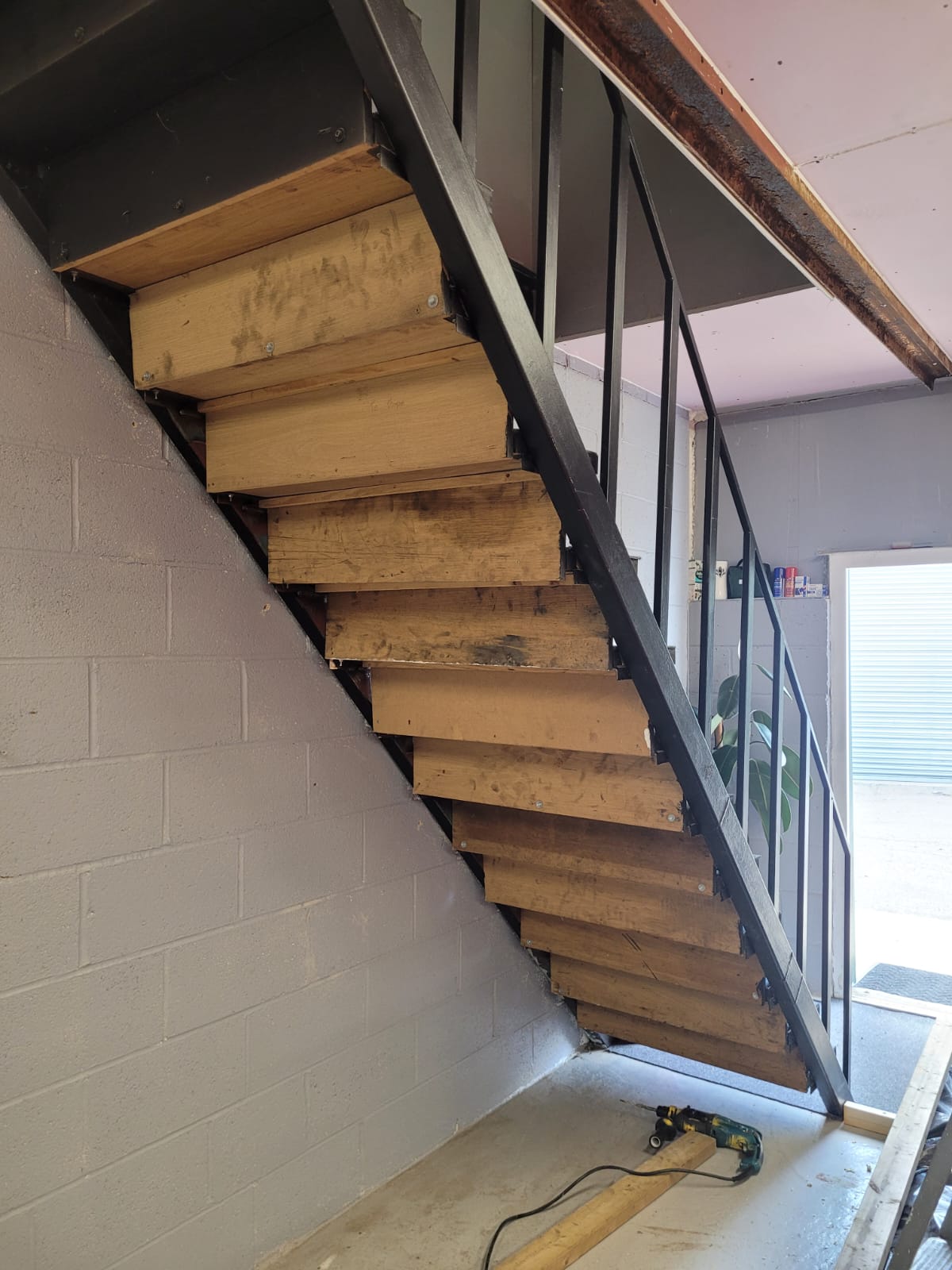 Steel staircase mid-refurbishment