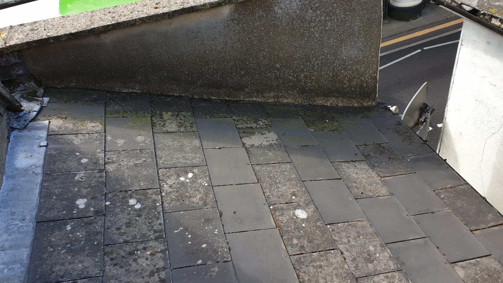 Slate roof cleaned, gutters cleared